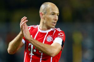 Robben creates history as Bayern go four points clear