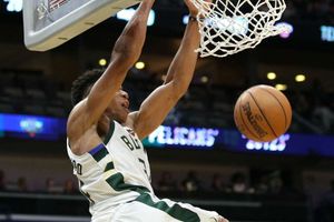 NBA: Antetokounmpo double-double helps Bucks survive late Cavs rally