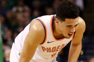 NBA: Suns star Booker carried off court after groin injury