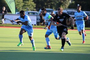 India quell New Zealand challenge