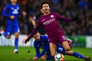 Bennett sorry for horror tackle on Sane