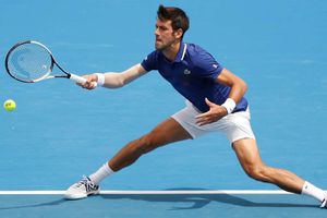 Sleeve-wearing Djokovic channels Kyrgios as he blitzes Thiem at Kooyong