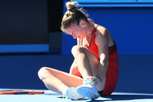 Halep faces nervous wait over ankle injury