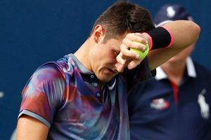Tomic has 'huge wake-up call', wants to return to tennis