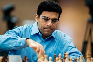Anand crushes Caruana to join Giri in lead