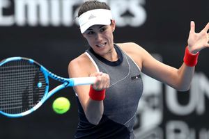 Garbine Muguruza makes winning start to new Martinez partnership at Qatar Open