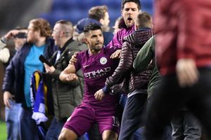 Aguero lashes out at fan as tempers flare after Wigan stun Man City