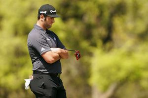 Jon Rahm joins Dustin Johnson in early elimination, Rory McIlroy hits back