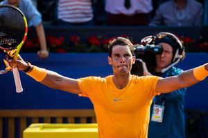 Resilient Nadal saves three set points to extend record