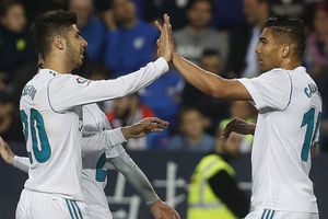 Real move up to third after Malaga win, Atletico close gap with Barca