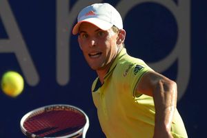 Thiem comfortable in victory as rain delays Wawrinka