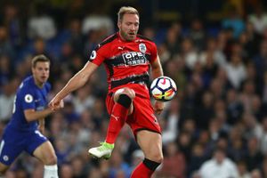 Huddersfield Town safe as Chelsea's Champions League hopes dented
