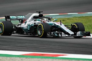 Hamilton triumphs in tense battle for Spanish GP pole