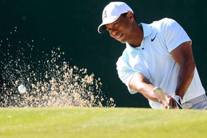Woods, McIlroy just make cut as Malnati leads