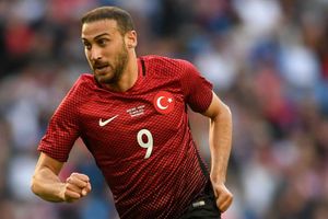 Turkey striker Tosun sorry for red card after supporter confrontation