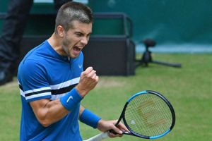 Coric stuns Federer to claim title in Halle