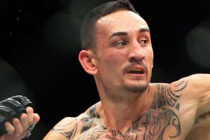 Featherweight champion Holloway pulls out of UFC 226