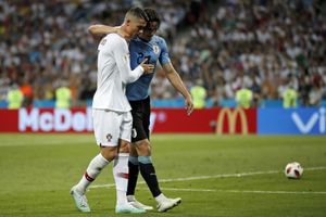 FIFA World Cup: Ronaldo's gesture to walk Cavani off-the-field leaves fans divided on Twitter