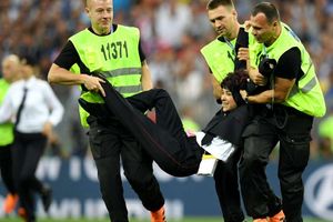 FIFA World Cup final interrupted by pitch invaders from anti-Putin group Pussy Riot