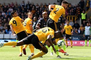 Wolves 1 Manchester City 1: Laporte rescues point after controversial handball goal