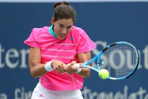 Rain halts Halep as Muguruza's defence ends and Wozniacki retires