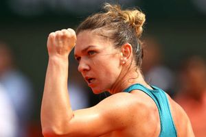 Halep battles through rain-interrupted Rogers Cup opener