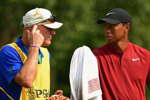 Tiger Woods' caddie tried to pay heckler to leave Firestone