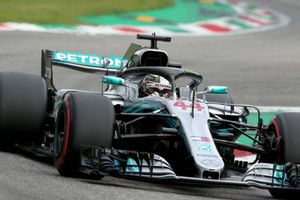 Lewis Hamilton claims record-equalling victory as Sebastian Vettel falters at Monza
