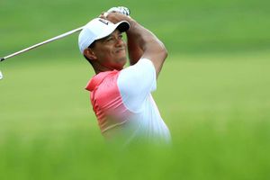 Tiger Woods leads by three at Tour Championship