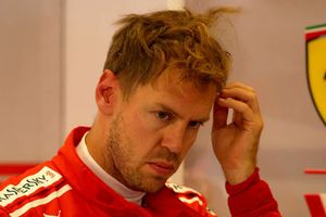 Hamilton's title chances enhanced by Vettel's grid penalty