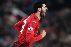 Manchester United 1 Young Boys 0: Fellaini drags dour Red Devils into knockouts