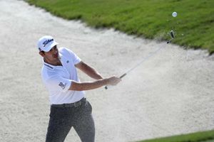 Cantlay and Reed share Hero World Challenge lead as Woods suffers