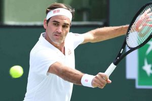 Federer too good for Edmund en route to last eight