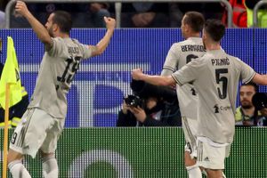 Cagliari 0 Juventus 2: Bonucci leads champions a step closer to title