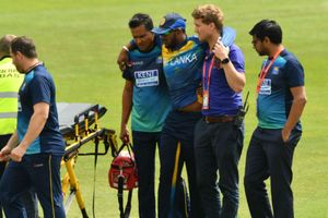 Oh-no Fernando! Sri Lanka opener taken off on a stretcher following injury