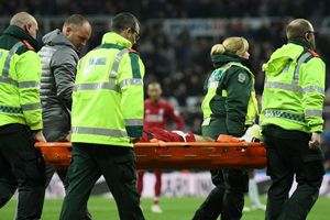 Mohmed Salah carried off on stretcher at St James' Park