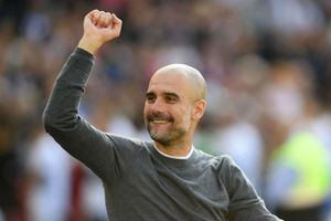 Guardiola challenges champions City to make history with treble