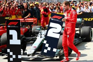 Defiant Vettel stuns Canada crowd by moving P2 sign to Hamilton's car