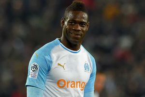 Mario's moped madness: Balotelli 'bets barman €2,000' to drive scooter into the sea