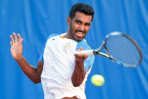 Prajnesh loses to Raonic in Wimbledon first round