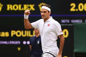 Federer hits slam landmark as Nadal urges patience for challengers