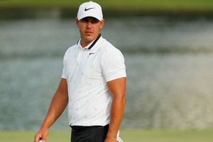 Koepka edges into lead at Tour Championship