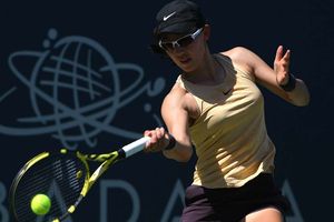 Zheng upsets Sabalenka to win first WTA title