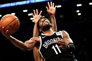 NBA: Irving scores 50 points in record-setting debut but Nets lose in OT