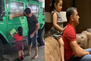 MS Dhoni's daughter Ziva helps daddy wash his new car, gives shoulder massage later - Watch