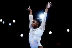 Simone Biles becomes first woman to win five all-around world titles
