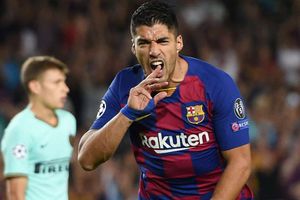 Barcelona 2-1 Inter: Messi returns as sublime Suarez secures comeback