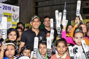 MS Dhoni celebrates Children's Day with students in Ranchi, sports 'Balidaan Badge' to show his love for Indian Army
