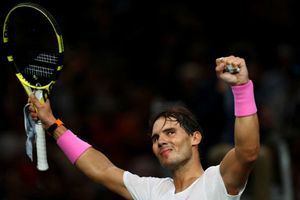 Nadal nudges Wawrinka aside to make Paris progress