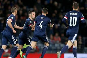 Scotland 3-1 Kazakhstan: McGinn at the double in comeback win